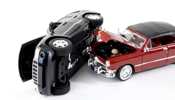 close up of collectible car over white background
